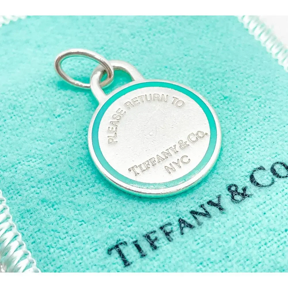 Tiffany & Co. Return to Tiffany Blue Enamel Border Round Charm Pendant Sterling